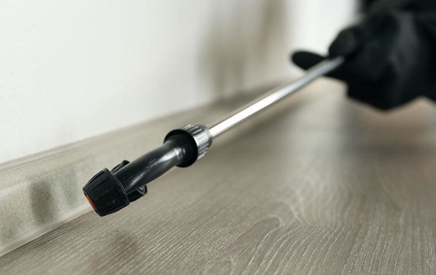 tech spraying inside commercial space