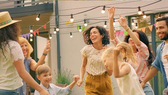 family outside enjoying backyard